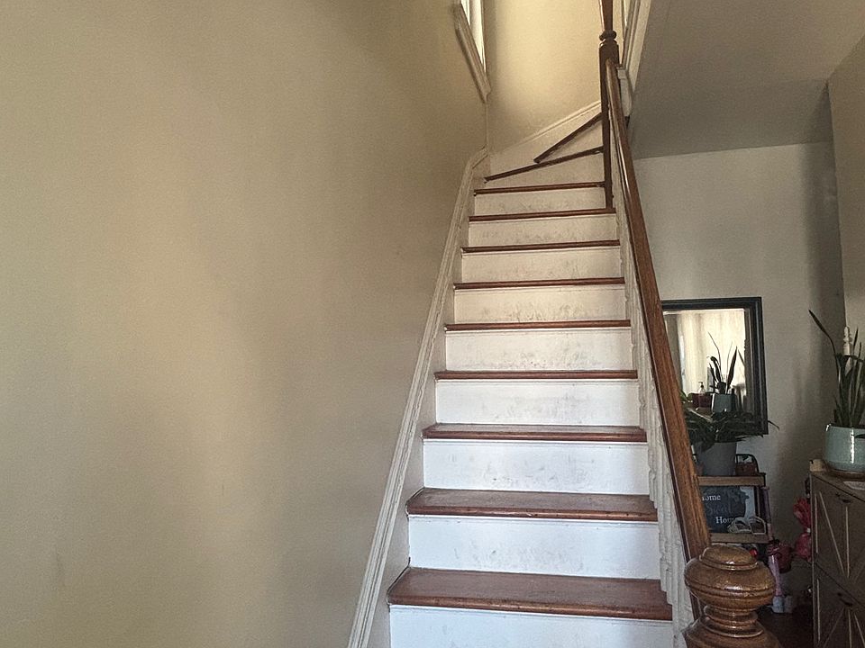 Stairs leading to the second floor apartment