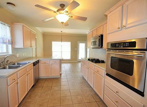 kitchen, gas cooktop, stainless appliances