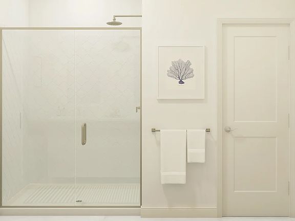 Primary bath with glass shower enclosure