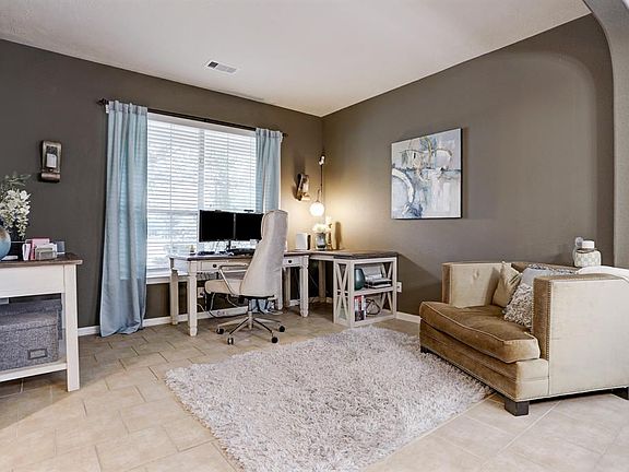 Currently, the space is a subdued Work From Home office space.
