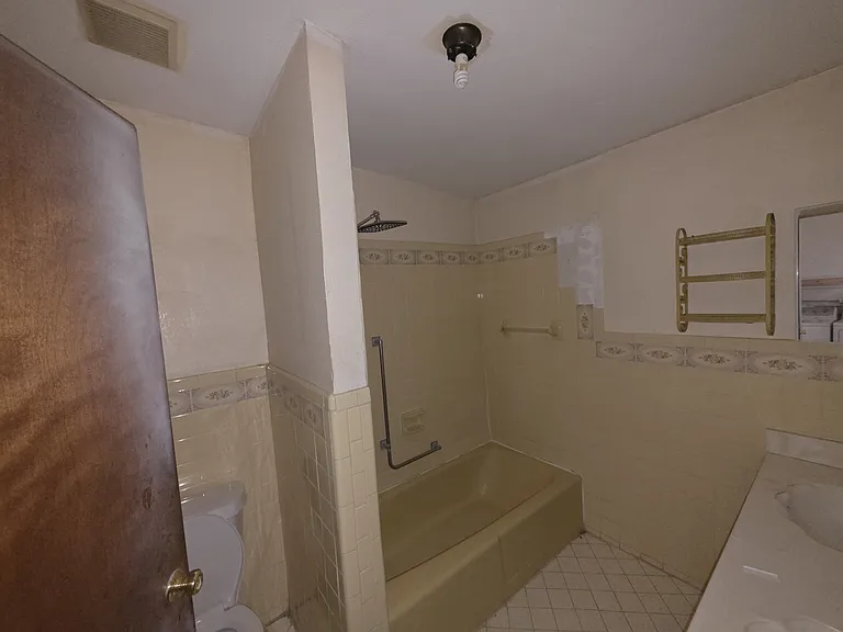 Bathroom with updated shower head