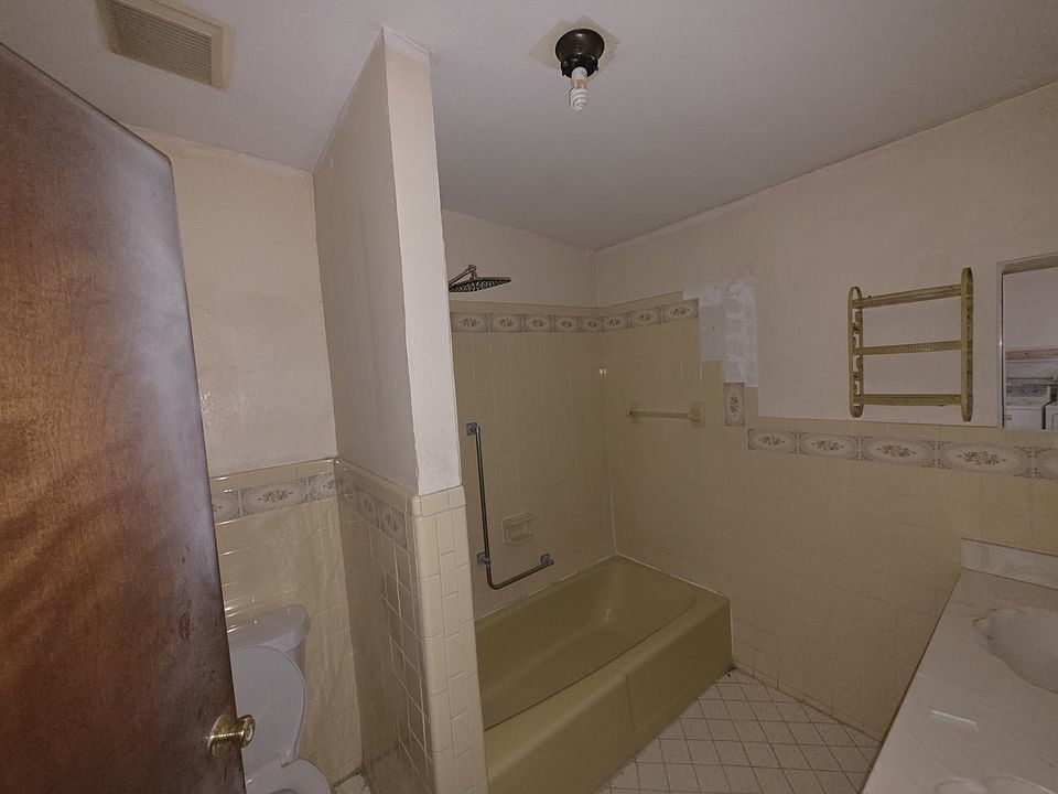 Bathroom with updated shower head