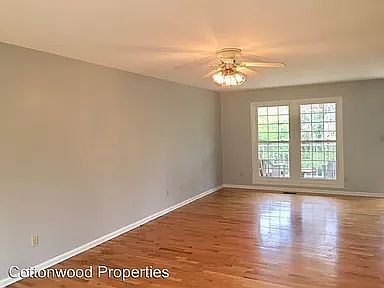Living room
Side deck visible through double doors that face Wolf Rd.