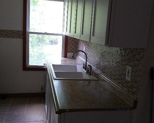 Two sink kitchen sink & spacious countertops.