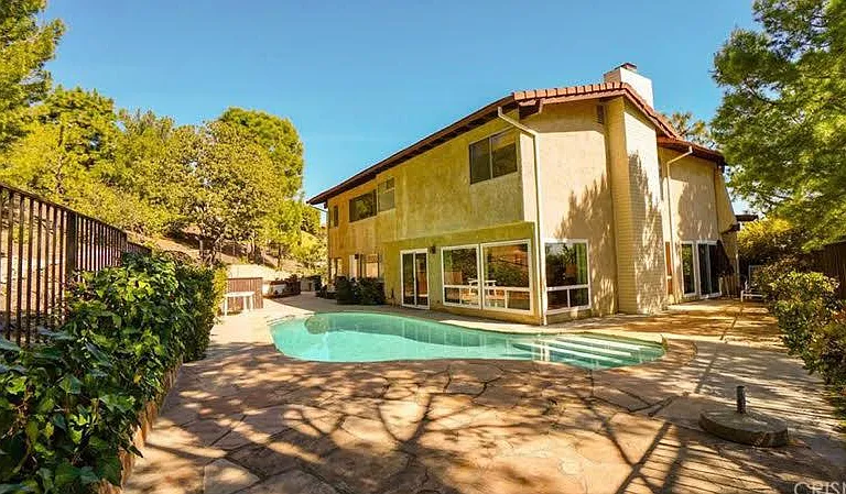 Private back and side yard. Large entertaining areas and pool.