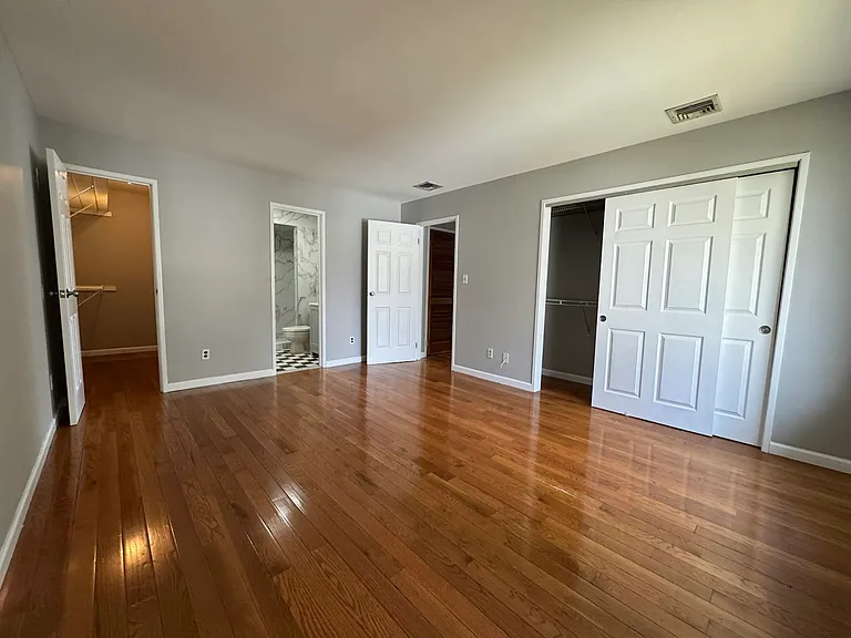 Primary Bedroom with walkin Closet