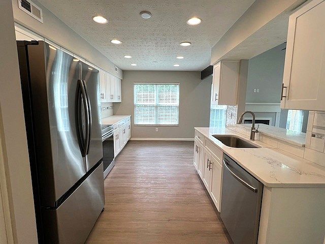 Heart of the home, reimagined _ our updated kitchen is full of light, life, and love.