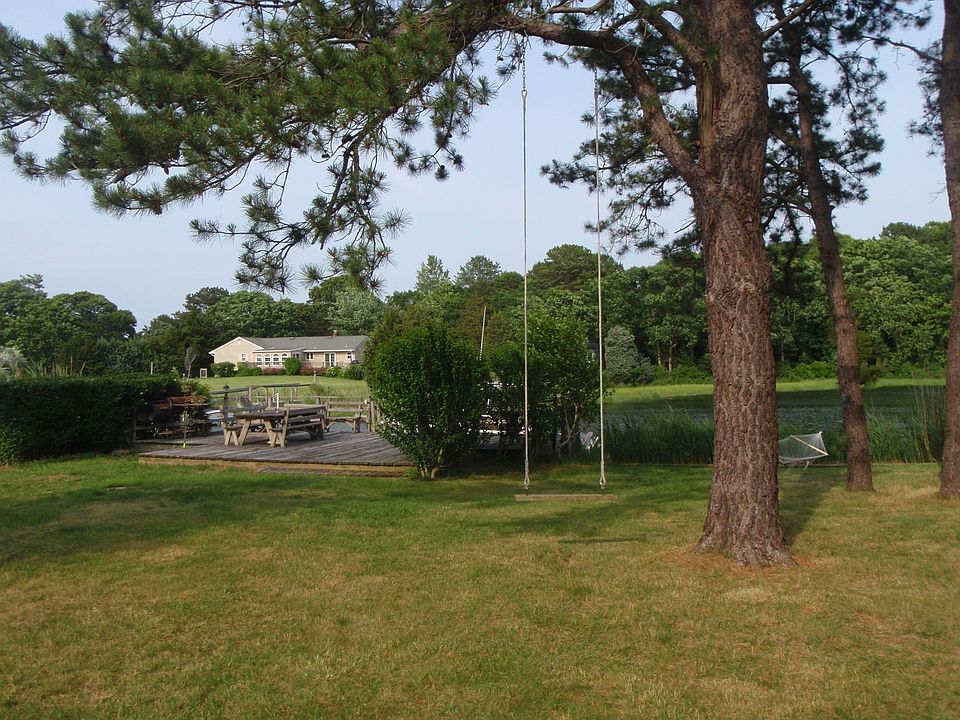 Back, Large yard w two decks and dock