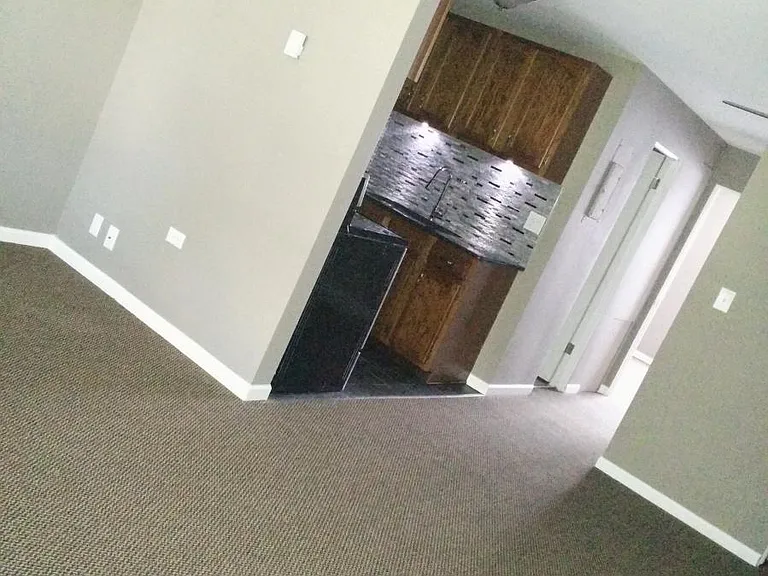 view to kitchen from front door