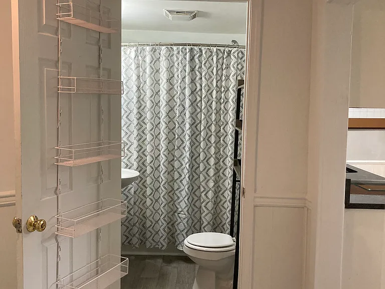 View of Bathroom from central hallway.