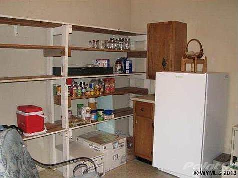 on the rear of the house, part of the addition.