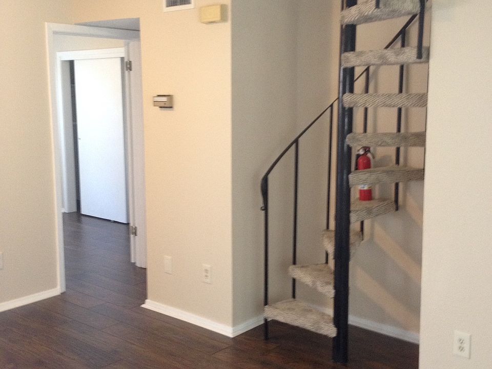 The staircase which leads to the loft upstairs.