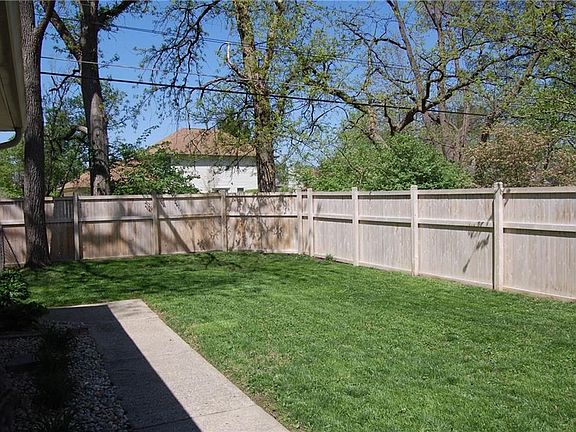 Back yard with attractive privacy fence