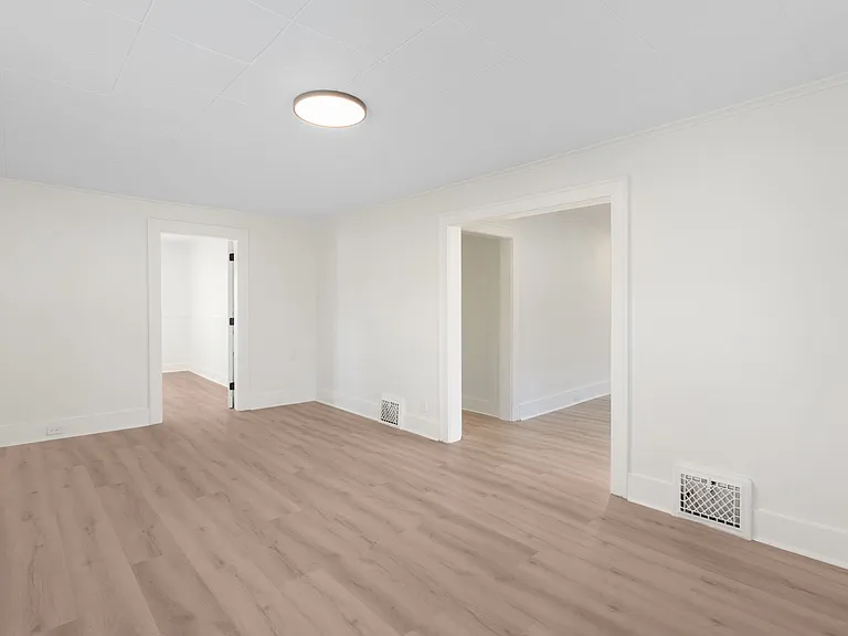 Living room showing entrance to Bedroom 1 and entrance to Dining Room