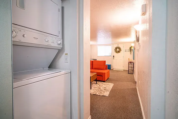 Washer and dryer in unit for extra comfort.
