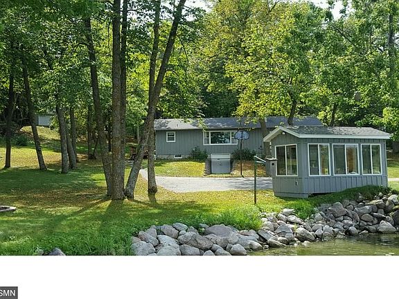 A lakeside compound.  Lovely main house with tons of potential, lakeside gazebo just a few feet from waters edge, guest house for those extended family and friends and 2 story spancrete garage with ample room for cars, boat, lawn equipment & workshop