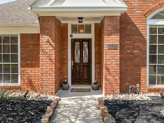 This property offers great curb appeal with mature trees and a welcoming sidewalk nestled by flowerbeds that beckons you to enter the home!