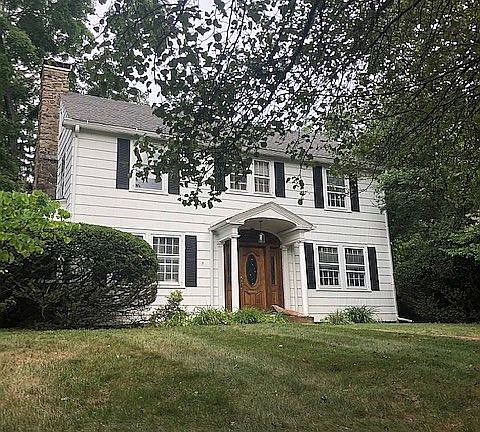 Showing stone chimney.