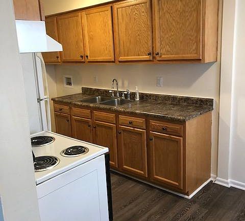 Offset to the right of the kitchen for a dinning table.