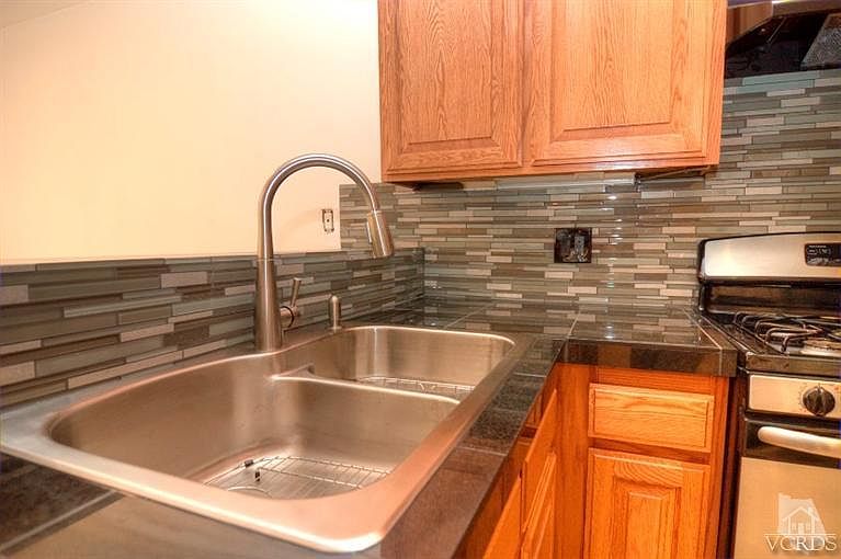 1st image of 6820 Remmet Ave Unit 104