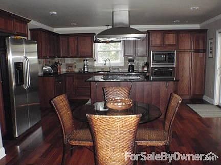 Great Room/Family Room
						:
						View from great room into kitchen.