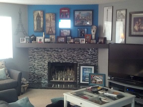 New Fireplace to match granite & back splash in kitchen