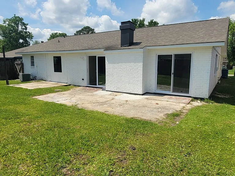 Large Fenced in Backyard with Patio