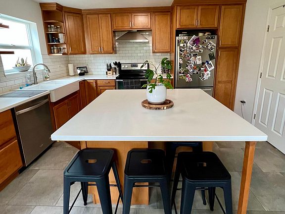 Huge kitchen island for cooking or creative projects.