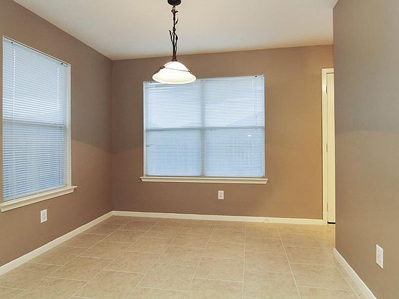 Breakfast Room - Enjoy a nice quite cup of morning coffee or a family meal here! It's also open to the kitchen! New tile!