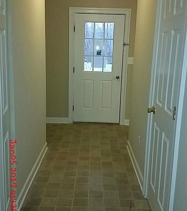looking down the hallway at front entry