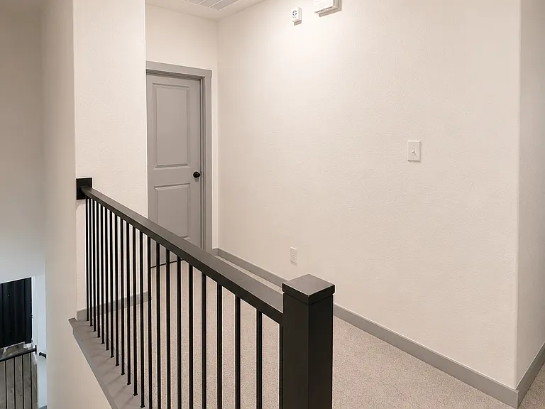 Walkway to primary bedroom