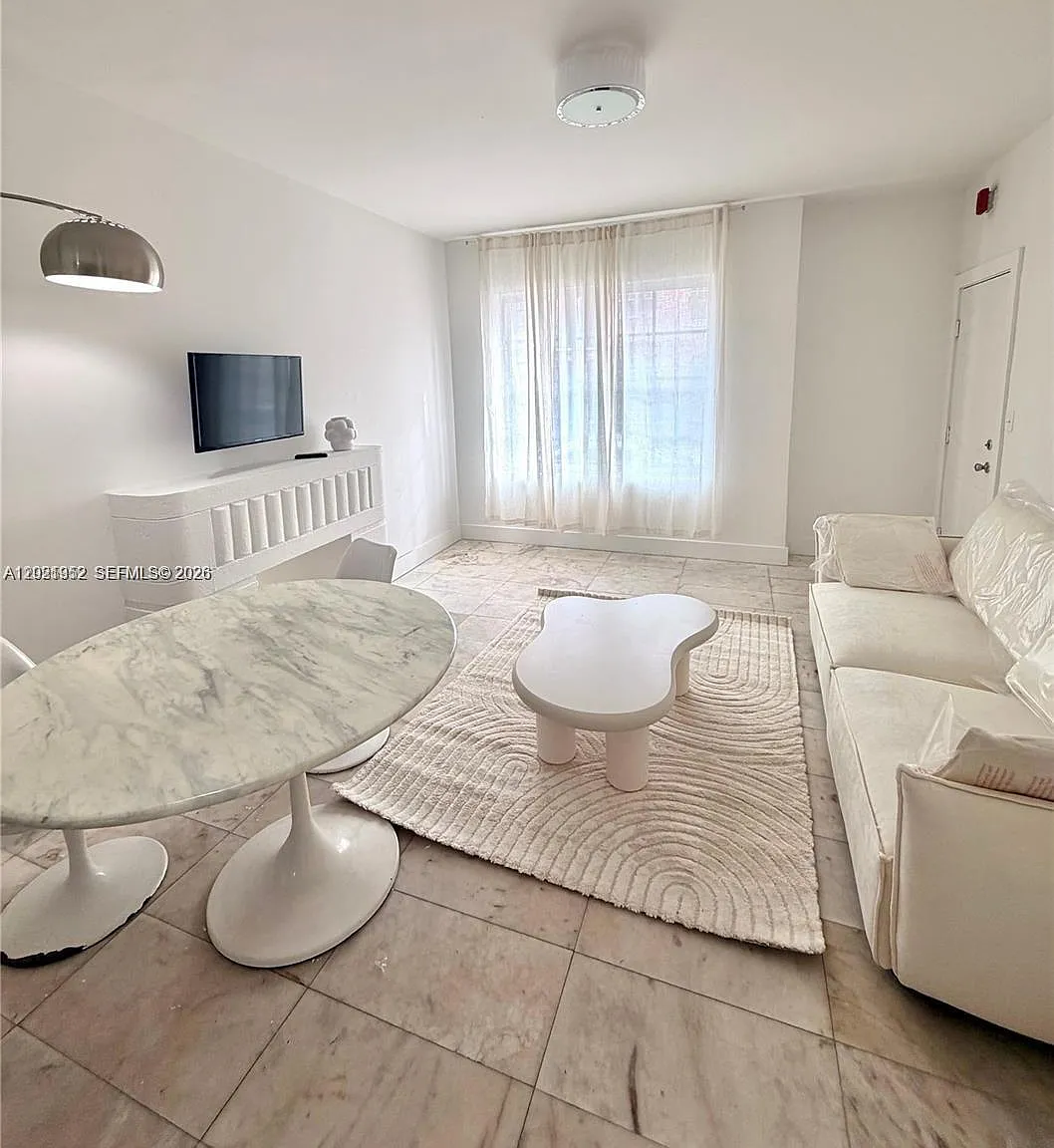 First On 8th Condo — Photo 1