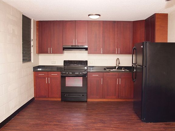 kitchen with granite countertops and newer appliances