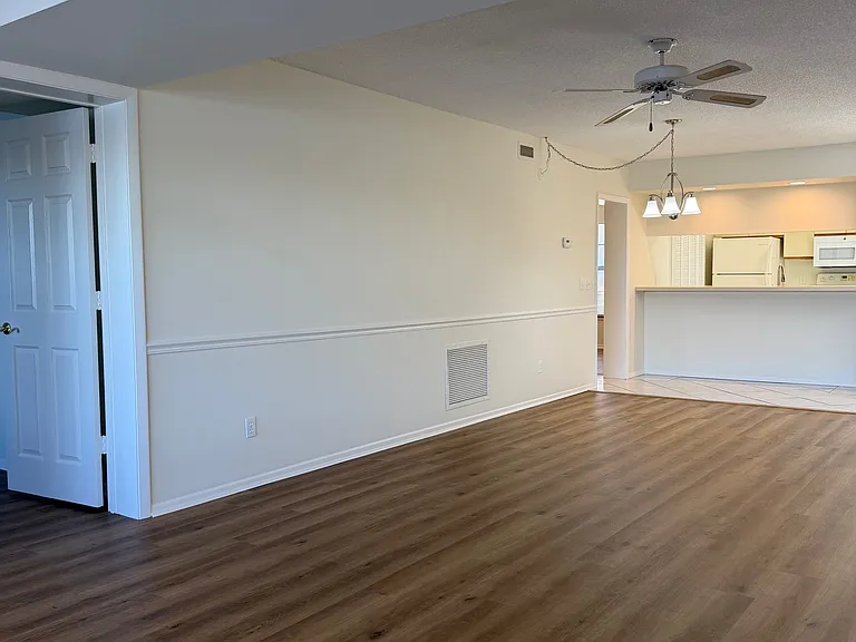 Freshly painted w/ vinyl plank flooring throughout.