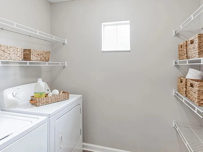 Each apartment boasts a full-size washer and dryer, with spacious laundry rooms and ample additional pantry storage.