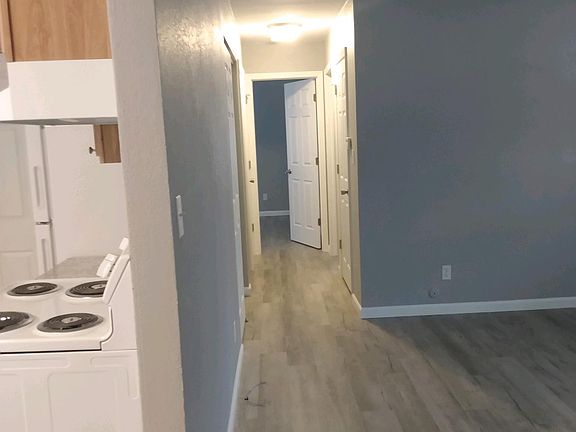 VIEW TO THE HALL, BATH & BEDROOMS.