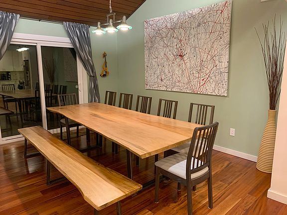 Custom built dining table. Seats 12-14.