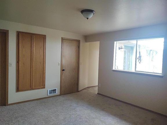 Master has built in storage, walk in closet, separate full bath, door that exits to back patio overlooking Quil Ceda Creek.