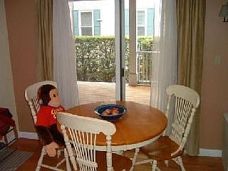 Skylighted Breakfast Nook with Sliders to Porch