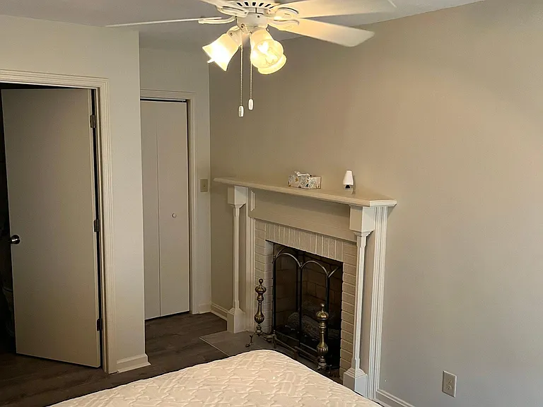 Room D - bathroom entrance on left, closet door on right