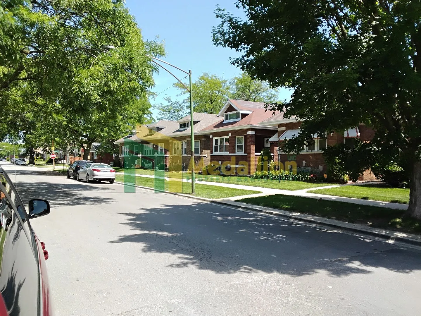Spacious 5-Bedroom Brick Bungalow with Updated Interior — Photo 2