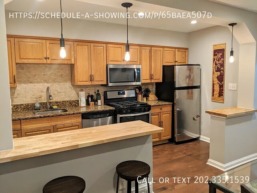 Two-Level 2BR + Bonus Room with Parking & In-Unit Laundry — Photo 4