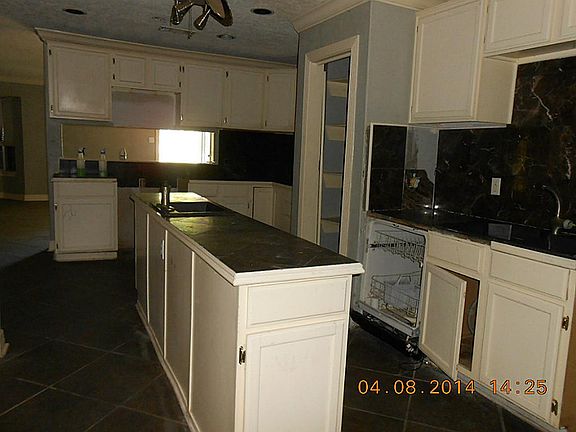 Kitchen has plenty of cabinets