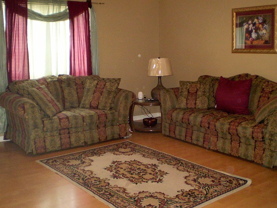 laminate wood floor in living room and hallway