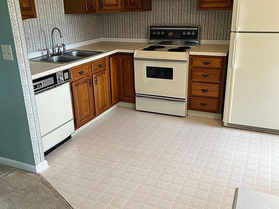Kitchen with wood cabinets