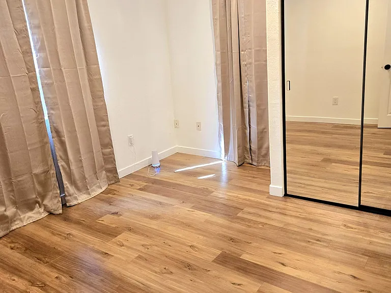 Bedroom 2 - new paint, new floors, new closet doors, new light fixture. 
ALL NEW AND CLEAN.