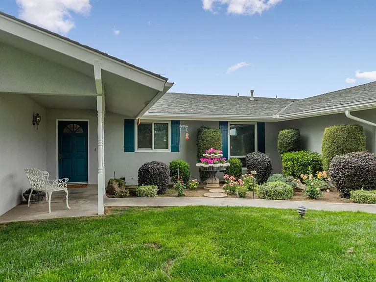 10521 N Minnewawa Ave — Photo 3