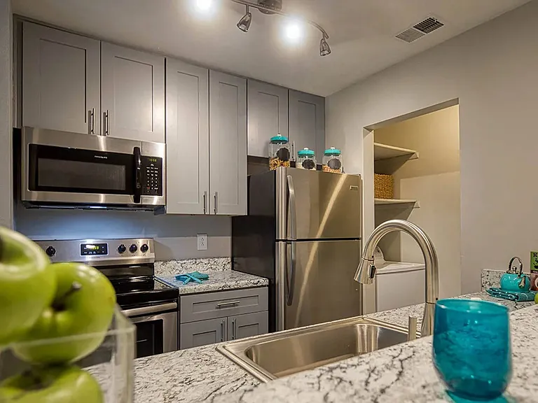 Kitchens are newly remodeled with granite and more