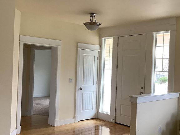 Hardwood throughout. New carpeting in bedrooms and living room.