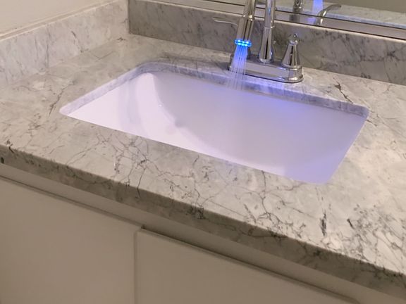 LED light faucet at m. Bath